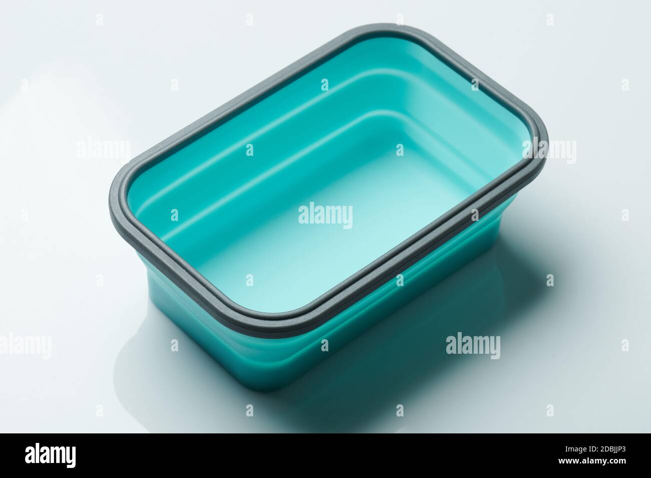 Perspective view of plastic colorful food storage box isolated Stock Photo