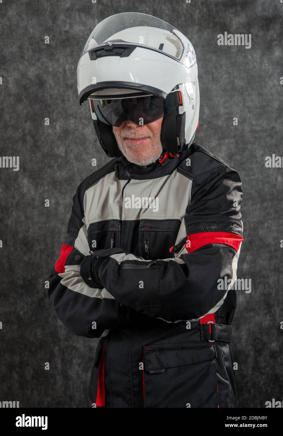 portrait of senior biker with a white helmet Stock Photo