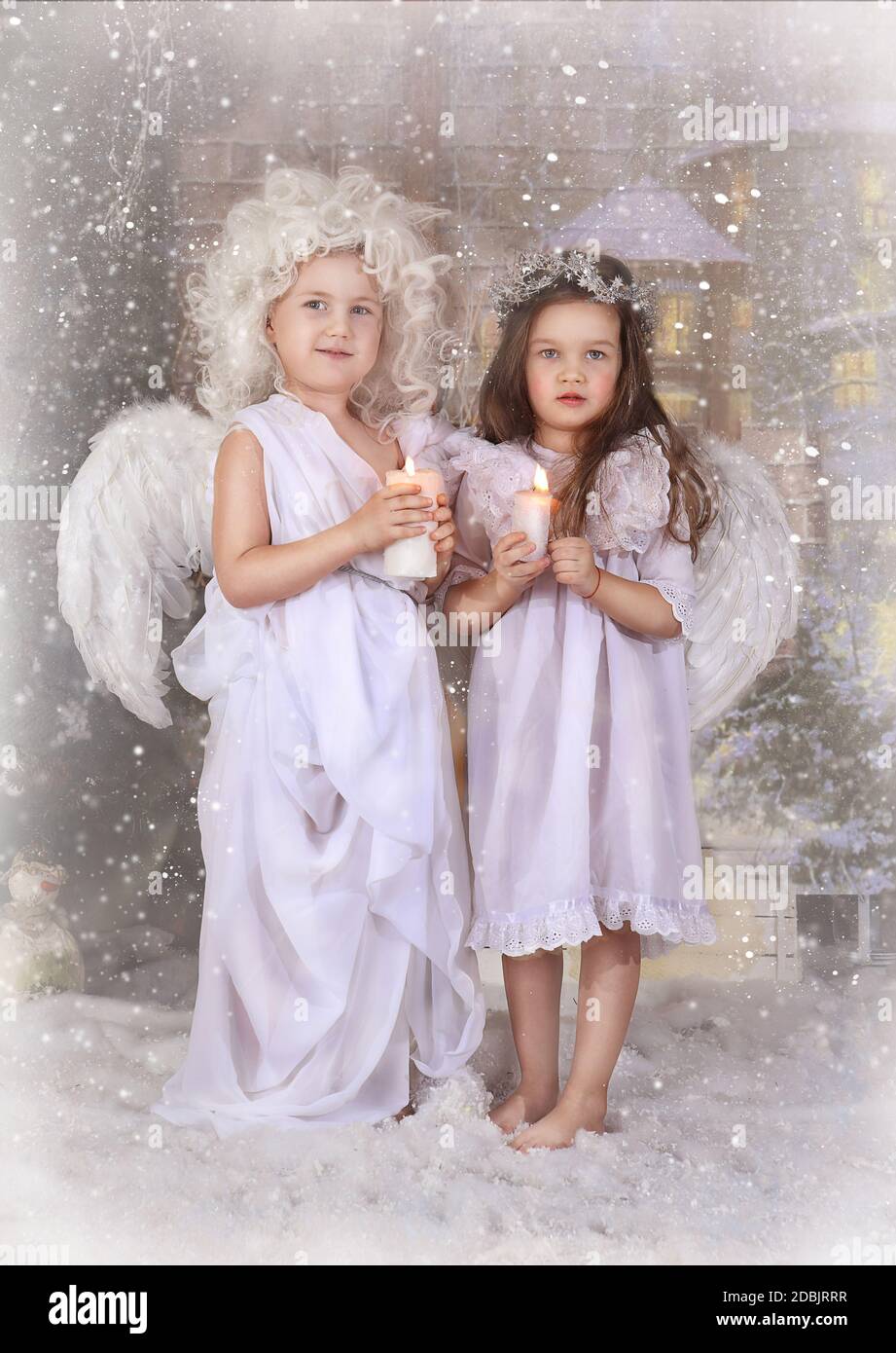 Little children dressed as Christmas angels Stock Photo - Alamy