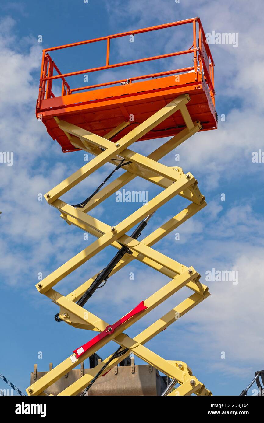 Tall Scissor Lift Platform Machine at Construction Site Stock Photo Alamy
