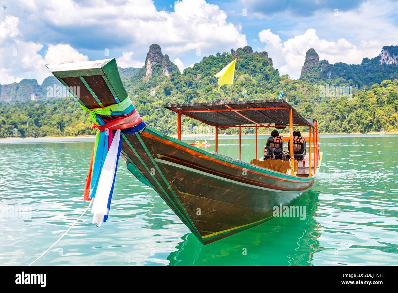 Wooden thai traditional long tail boat on Cheow Lan lake, Ratchaprapha