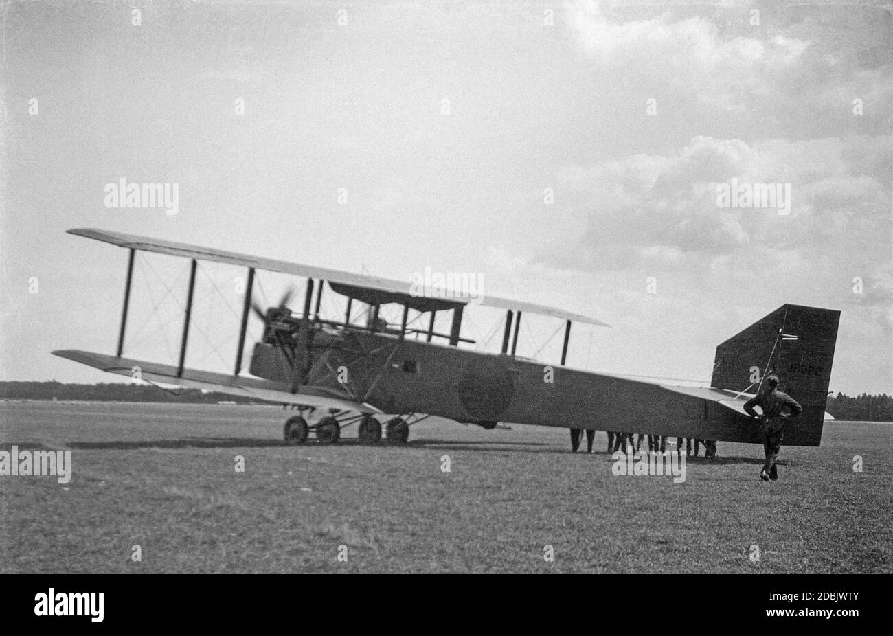 A vintage black and white photograph of a British Royal Air Force, RAF
