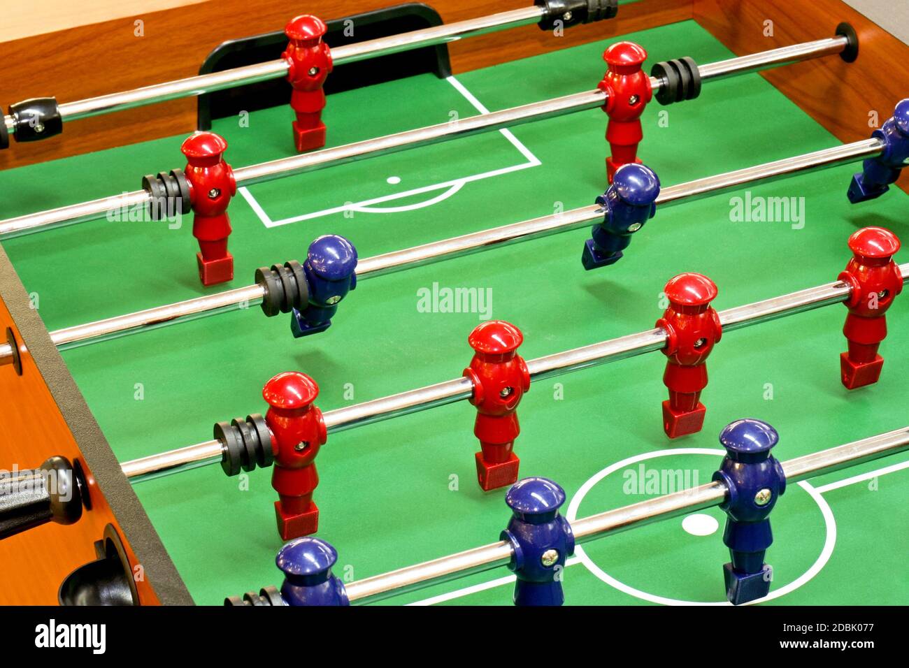 Tabletop foosball game with red and blue figures Stock Photo Alamy