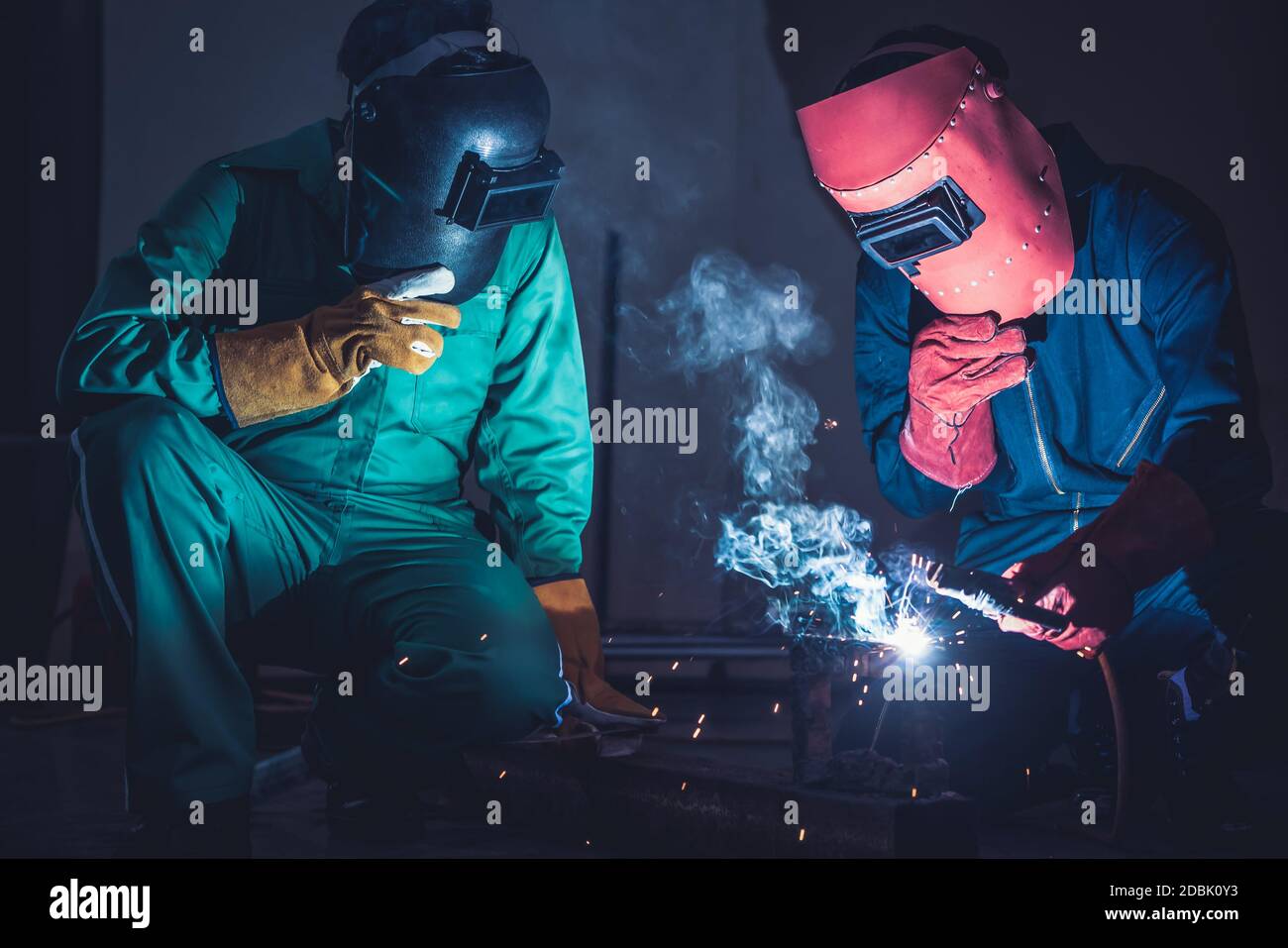 Metal welding steel works using electric arc welding machine to weld