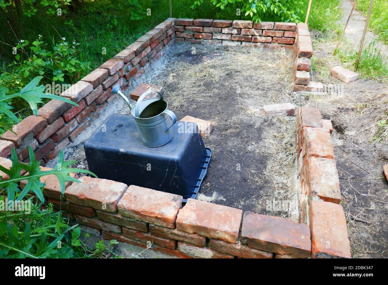 Raised bed made of bricks Stock Photo Alamy