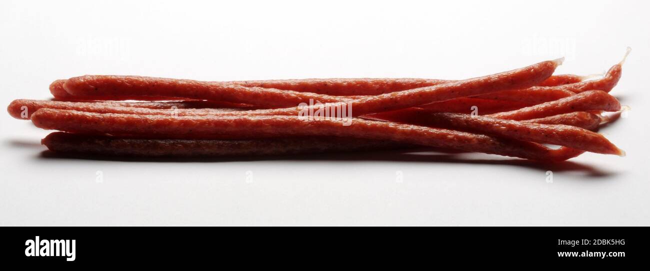 Salami stick tyrolini flatlay isolated Stock Photo