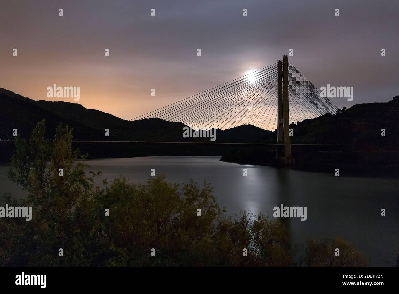 Reservoir bridge of Barrios de Luna, LeÃƒÂ³n. With full moon. Stock Photo