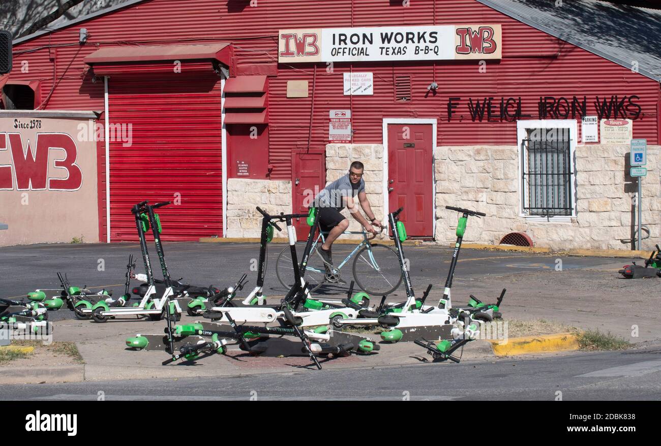 Scooters litter the corners of East Cesar Chavez and Red River Street