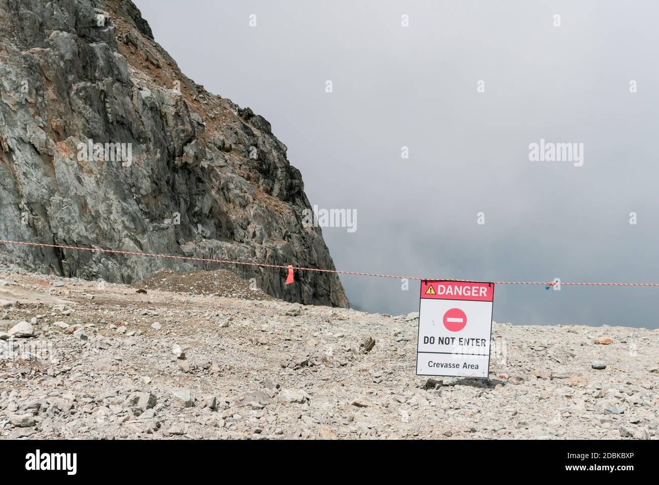 Warning sign near crevasse, WhistlerÃ‚Â BlackcombÃ‚Â Ski Resort, Whistler, British Columbia, Canada Stock Photo