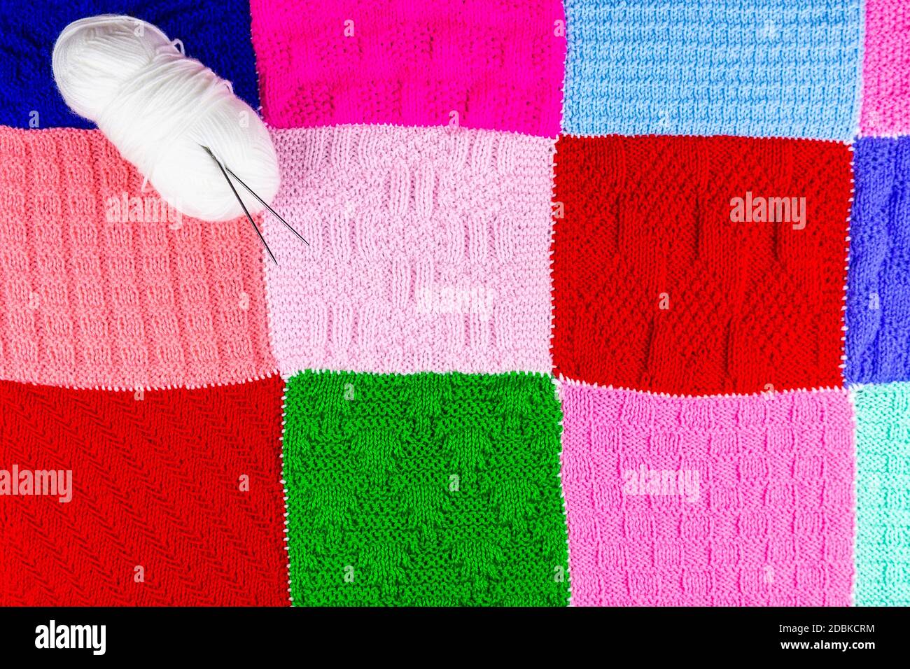 Knitted background. Knitted texture. A sample of knitting from wool ...