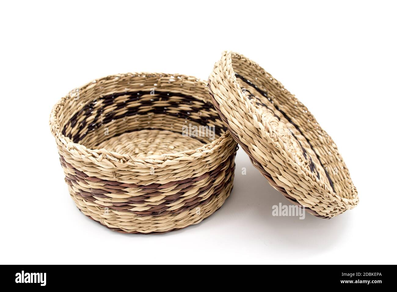 Isolated wicker basket on a white background Stock Photo - Alamy