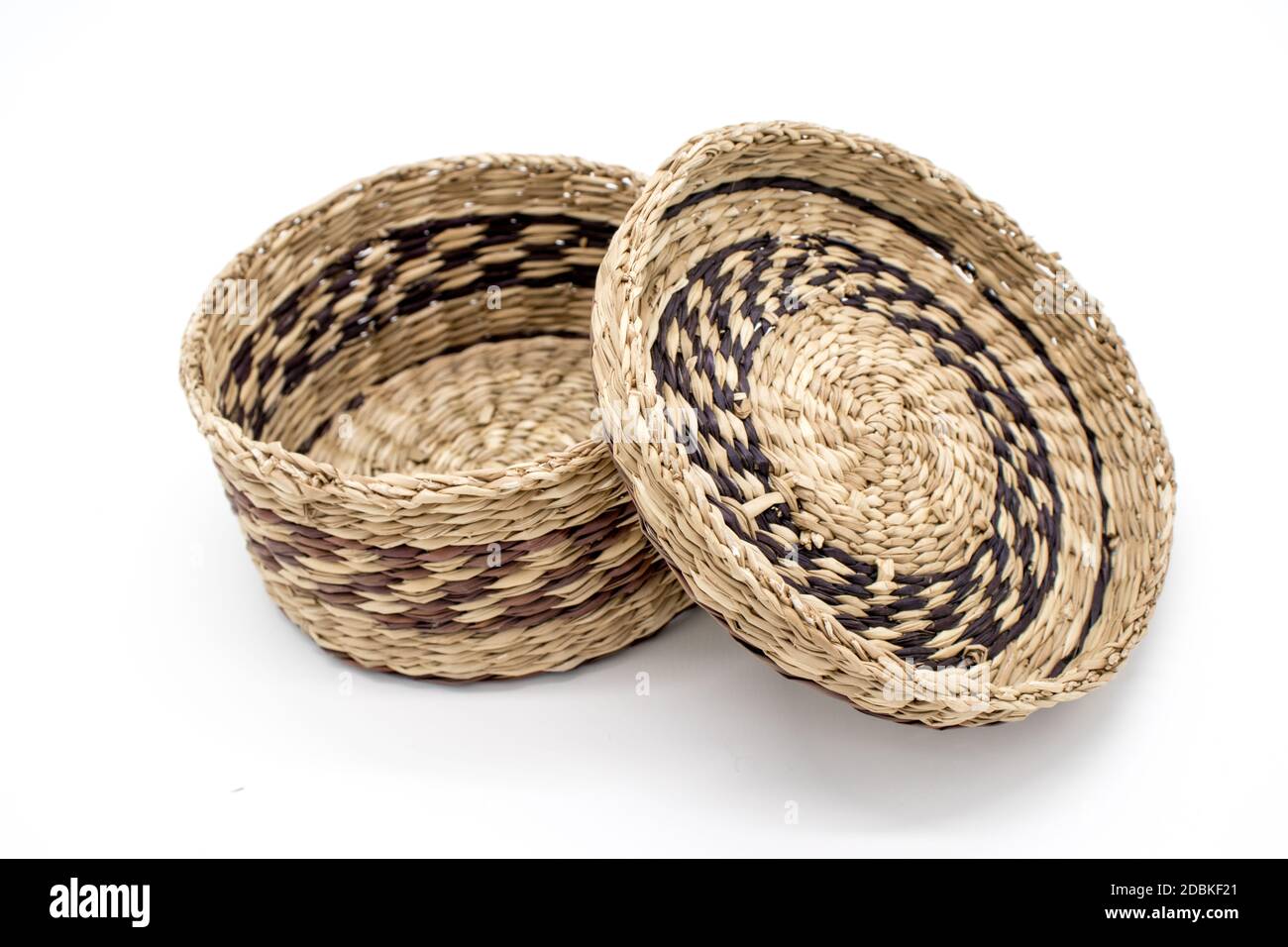 Isolated wicker basket on a white background Stock Photo - Alamy