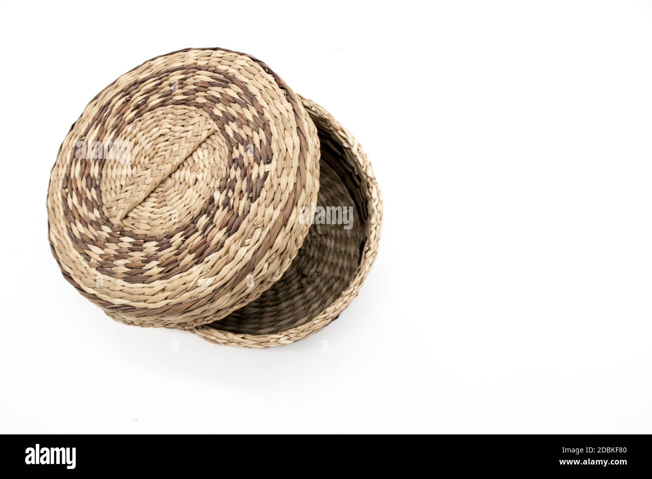 Isolated wicker basket on a white background Stock Photo - Alamy