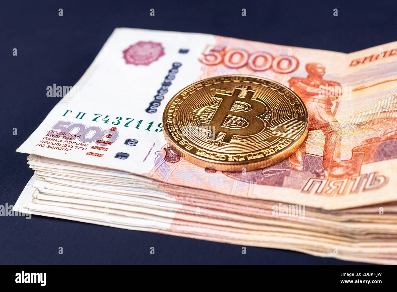 bitcoin cryptocurrency with russian rubles money, five thousand banknotes  closeup Stock Photo - Alamy
