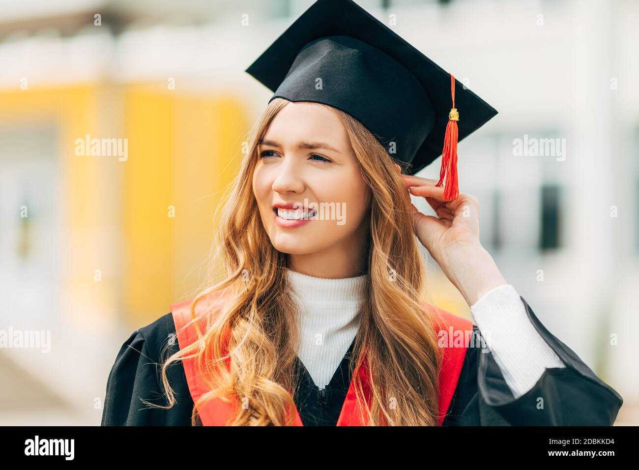 Happy beautiful girl student, in a master's dress. Concept of the graduation  ceremony Stock Photo - Alamy