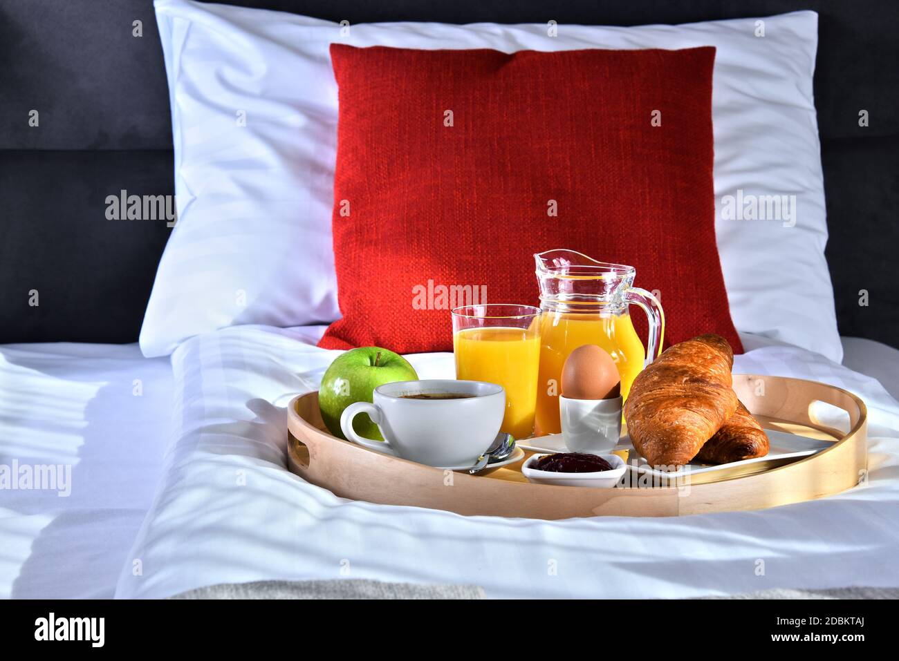 Breakfast on tray in bed in hotel room Stock Photo - Alamy