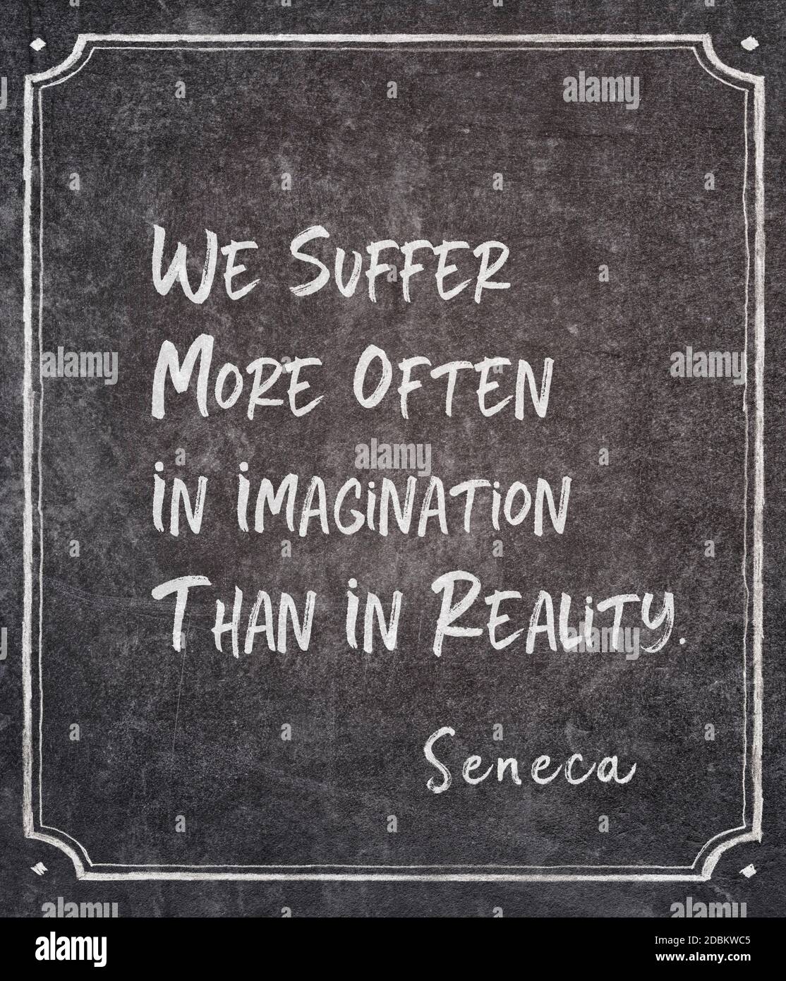 We suffer more often in imagination than in reality - ancient Roman philosopher Seneca quote written on framed chalkboard Stock Photo