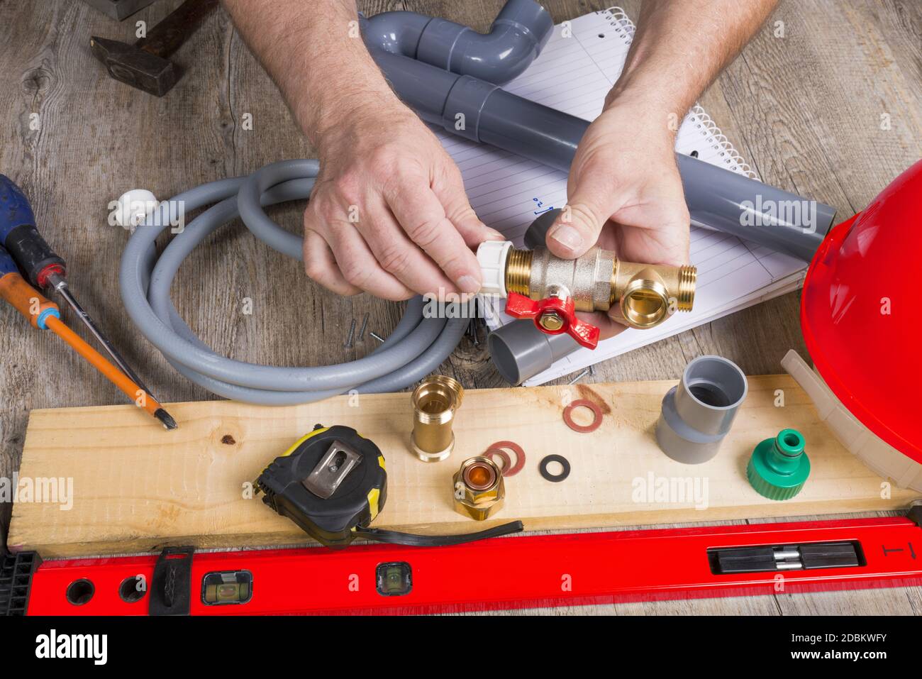 a close up of plumbing with different tools and accessories Stock Photo