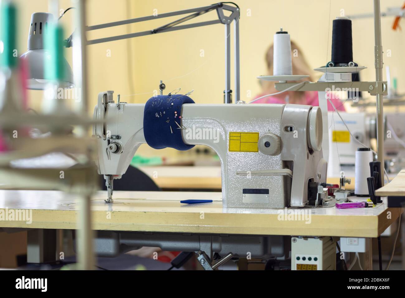 industrial sewing machine in the workshop of the atelier Stock Photo ...