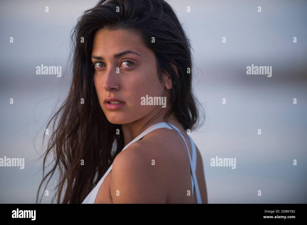 Portrait of young woman with black hair Stock Photo