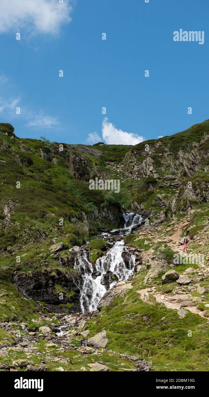 Mountain small stream with a blue sky Stock Photo