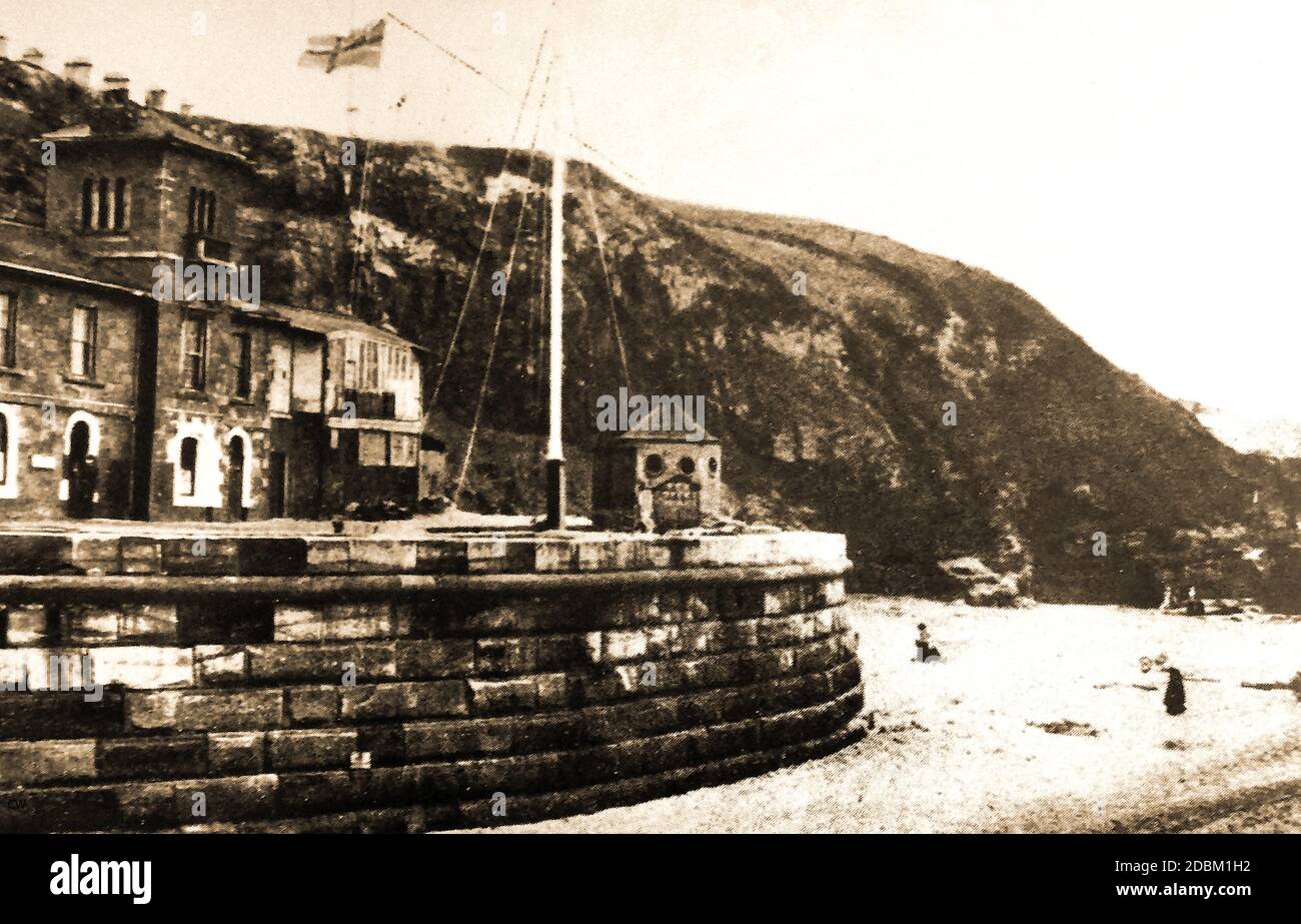 A 1905 photograph of Whitby (Yorkshire, England) coastguard station (Now a cafe) on the Battery (aka Battery Parade). The conical building was used for storing explosives used for  rocket propelled rescue lines. Stock Photo