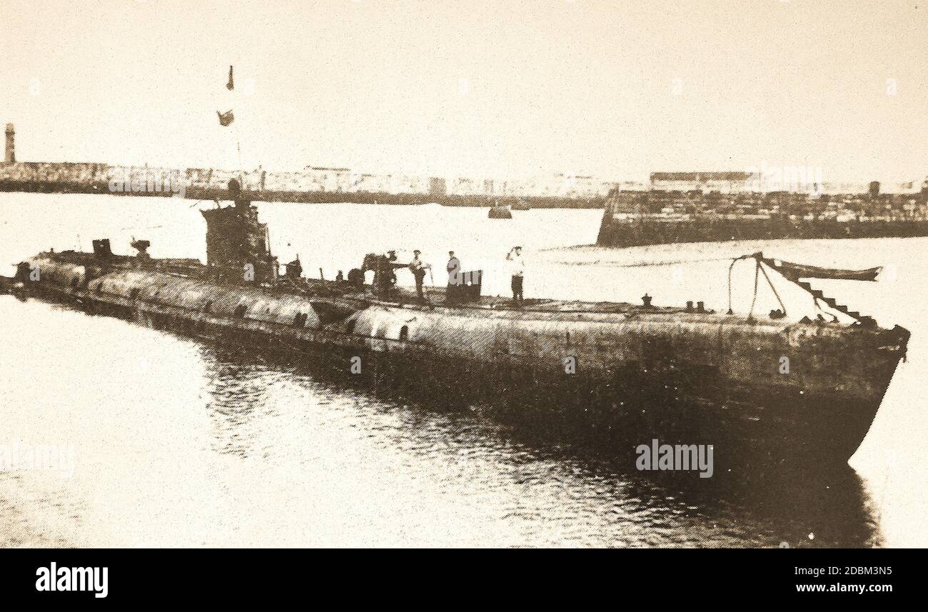 A newspaper photo of the captured 247 ft long German submarine (U-boat) U 98 in Whiby Harbour, UK. She was launched on 31 August 1940 and commissioned on 12 October, with a crew of 46 under the command of Kapitänleutnant Robert Gysae, operating from St. Nazaire in France. Considering  she was supposedly sunk on 15 November 1942 west of the Straits of Gibraltar  (or alternatively severely damaged off Cape St Vincent, Spain) , this raises a question regarding which ,if any ,   is true, or if the uboat in the picture was wrongly identified. Stock Photo