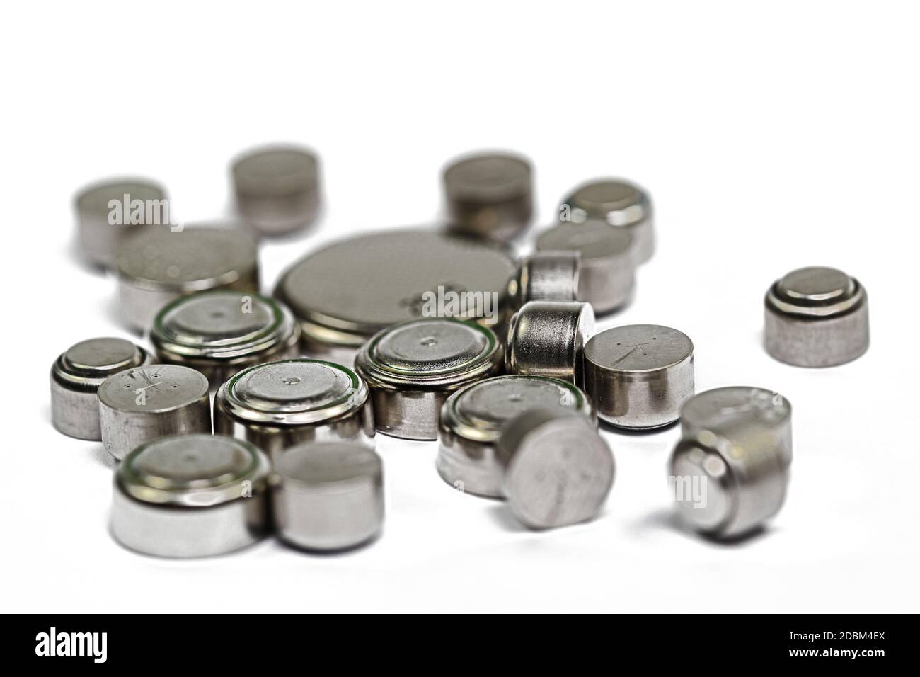 Various button cells against a white background Stock Photo Alamy
