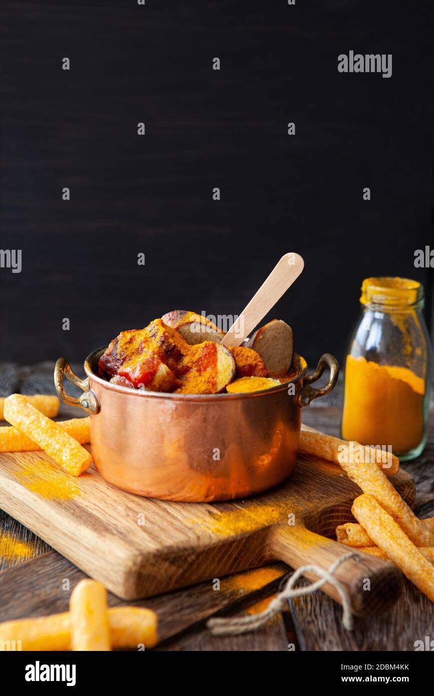 Delicious bratwurst with a spicy tomato curry sauce Stock Photo Alamy