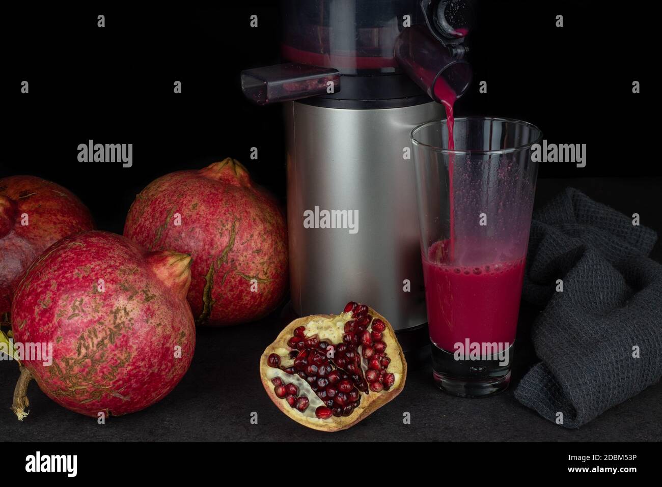 Juice extractor for healthy pomegranate juice. Healthy life concept Stock Photo
