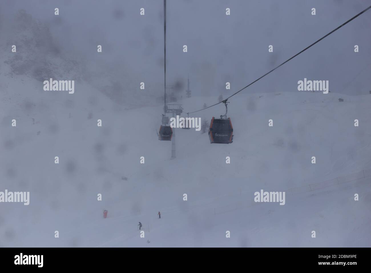 Ski gondola in heavy snow, Val Gardena, Dolomites, Italy Stock Photo