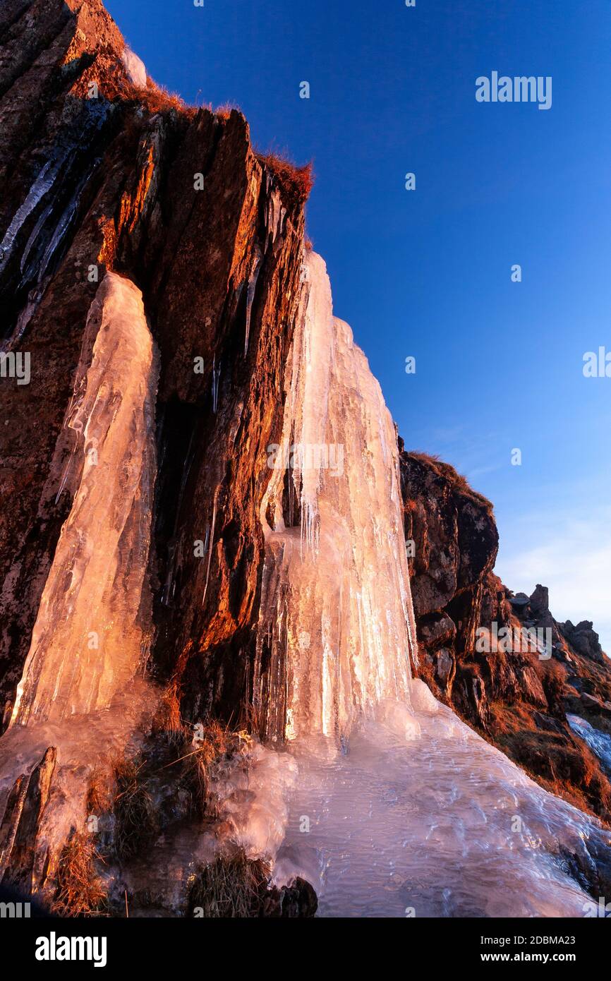 Frozen waterfall on the Miner's Track, Snowdon mountain, North Wales Stock Photo