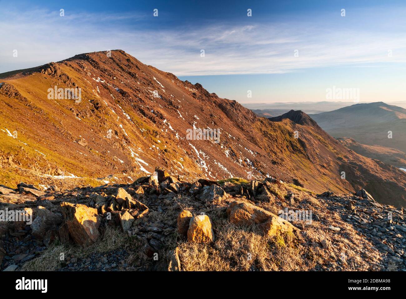 Crib Goch with snow from the summit of Snowdon, North Wales Stock Photo