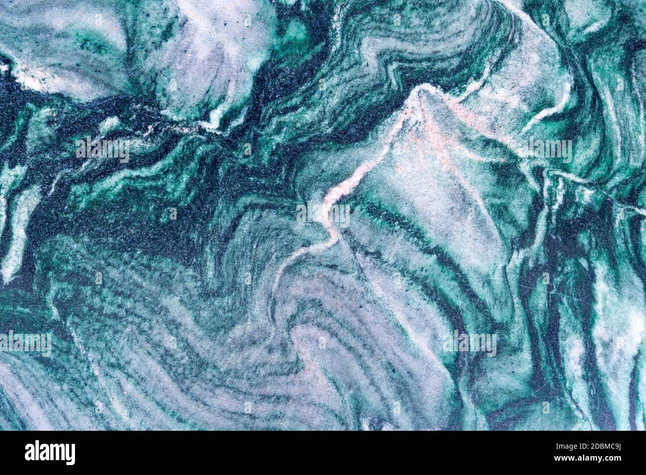 A structure of different stone types as a background Stock Photo - Alamy