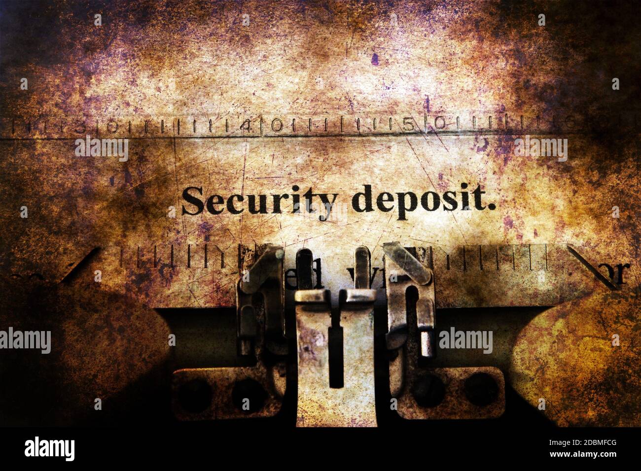 Security deposit text on vintage typewriter Stock Photo - Alamy