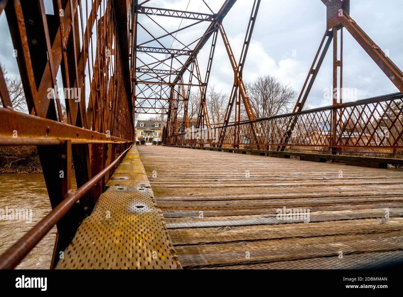 old bridge in rusty metal structure and wooden floor of SaintPie