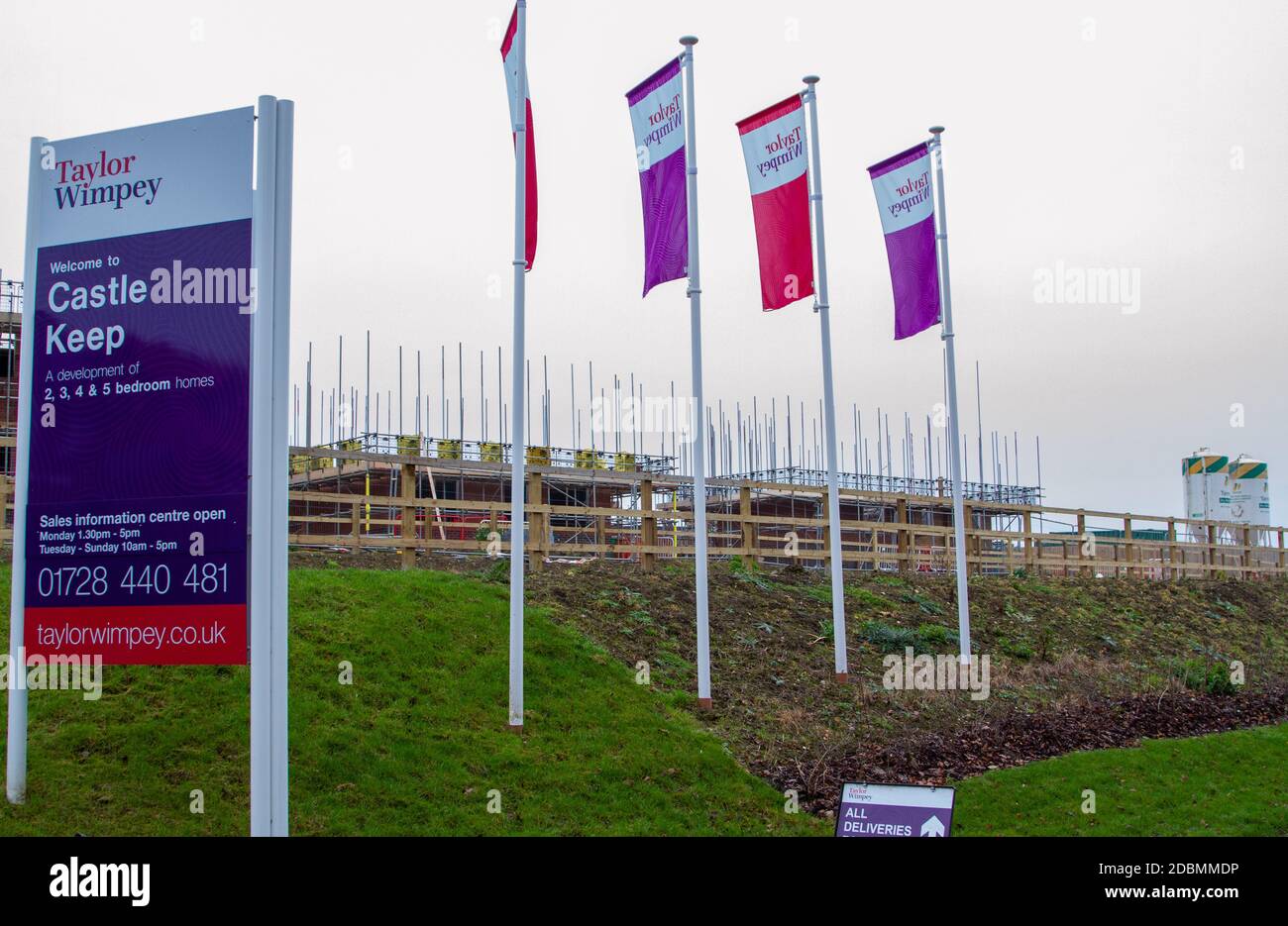Flags by a Wimpey Taylor housing development in Framlingham Suffolk Stock Photo