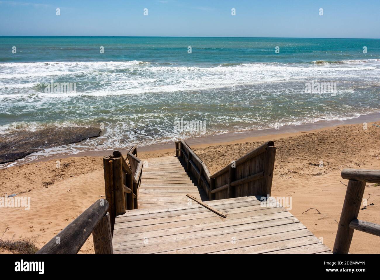coastal sea, surf and sand on Guardamar beach area near Alicante Stock Photo