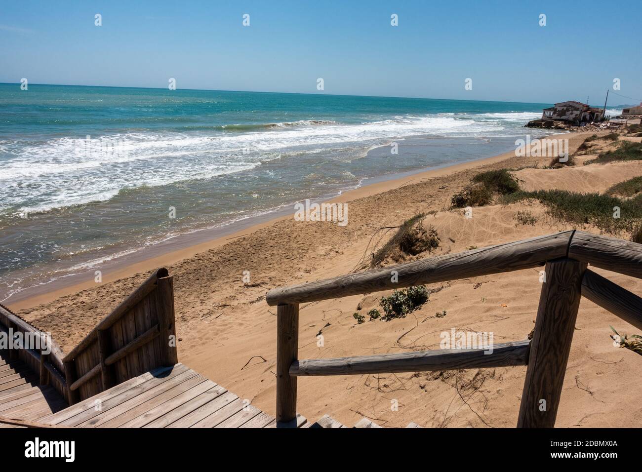coastal sea, surf and sand on Guardamar beach area near Alicante Stock Photo