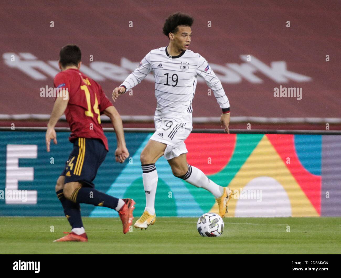 Sevilla, Spain. 17th Nov, 2020. Football: Nations League A, Spain - Germany, Group stage, Group 4, Matchday 6 at the Estadio de la Cartuja. Germany's Leroy Sane (r) and Spain's Jose Gaya fight for the ball. IMPORTANT NOTE: In accordance with the regulations of the DFL Deutsche Fußball Liga and the DFB Deutscher Fußball-Bund, it is prohibited to use or have used in the stadium and/or from the game taken photos in the form of sequence pictures and/or video-like photo series. Credit: Daniel Gonzales Acuna/dpa/Alamy Live News Stock Photo