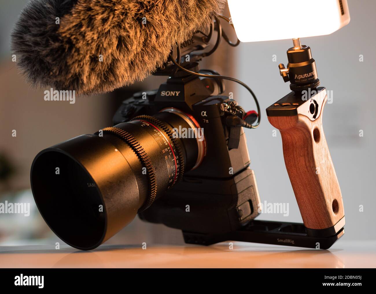Sony A7iii Cine rig, with a RODE Mic Pro plus. Aputure Lights attatched. This cine rig is on a Small Rig wooden handle. The perfect hand held. Stock Photo