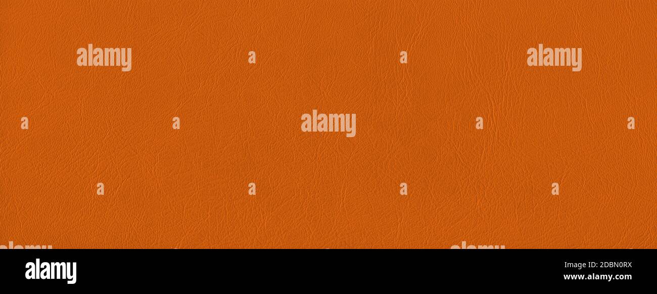 Orange leather texture background. Natural material banner. Stock Photo