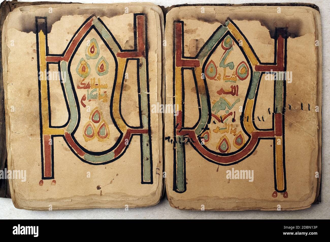 This is a copy of the Holy Koran written in Sûqî script during the 17 th century in the private library Mamma Haidara in Timbuktu , Mali , Africa . Stock Photo