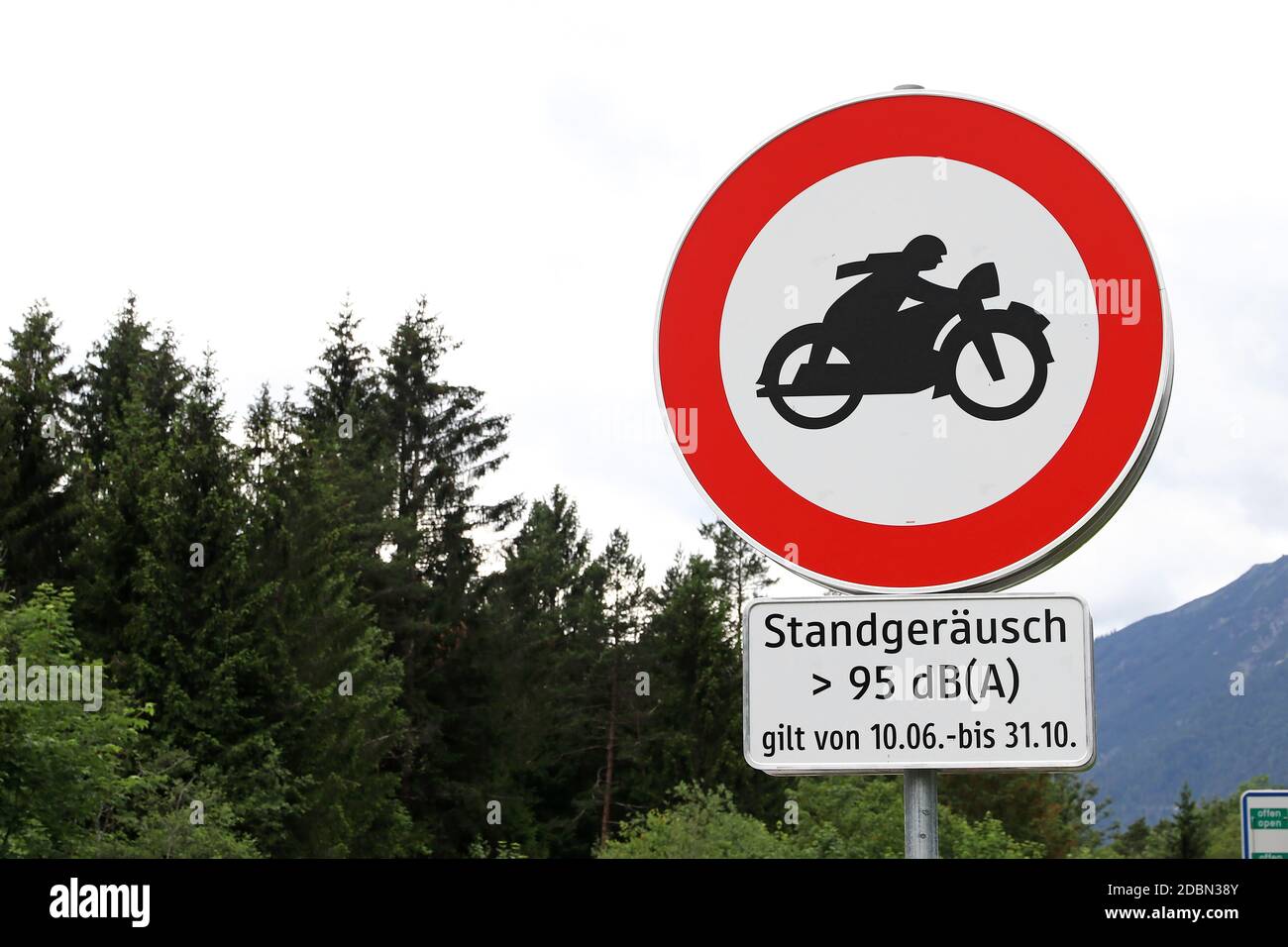 Sign with driving ban for too loud motorcycles in Tirol in Austria Stock Photo