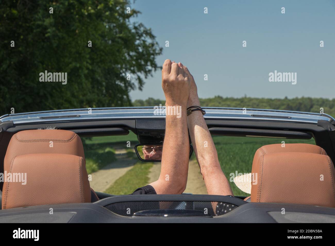 Senior couple in sports car Stock Photo