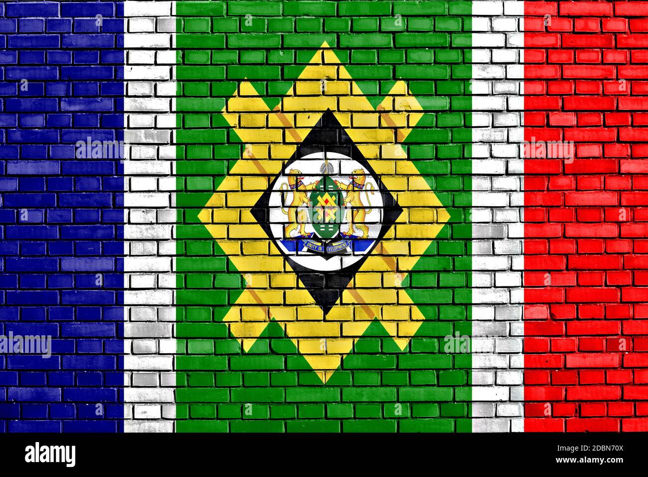 flag of Johannesburg painted on brick wall Stock Photo