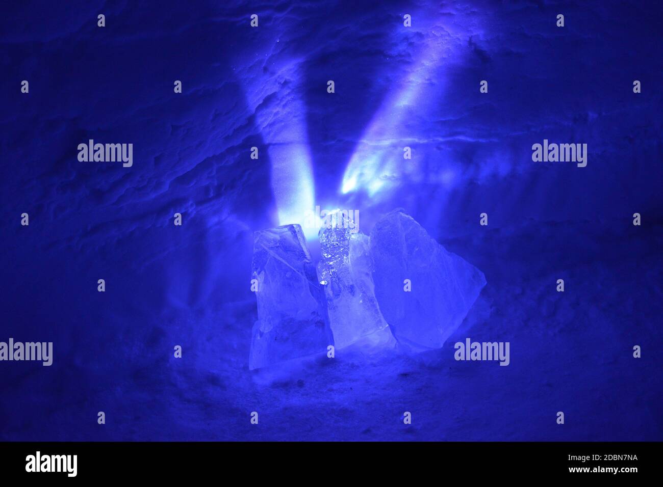 Expoloding Ice Chunks A small light source causes exploding purple rays to spread out from ...