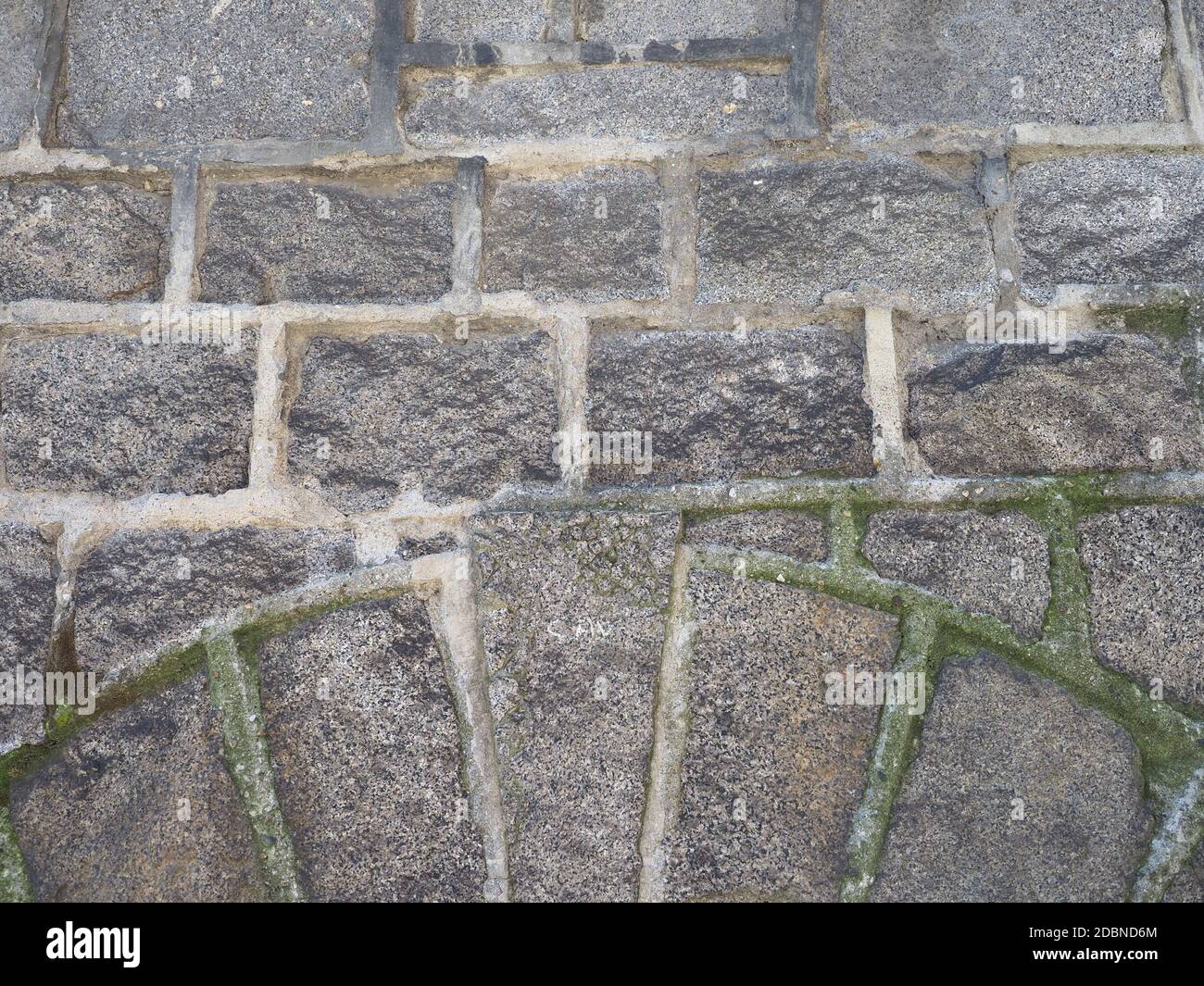 grey stone wall useful as a background Stock Photo - Alamy