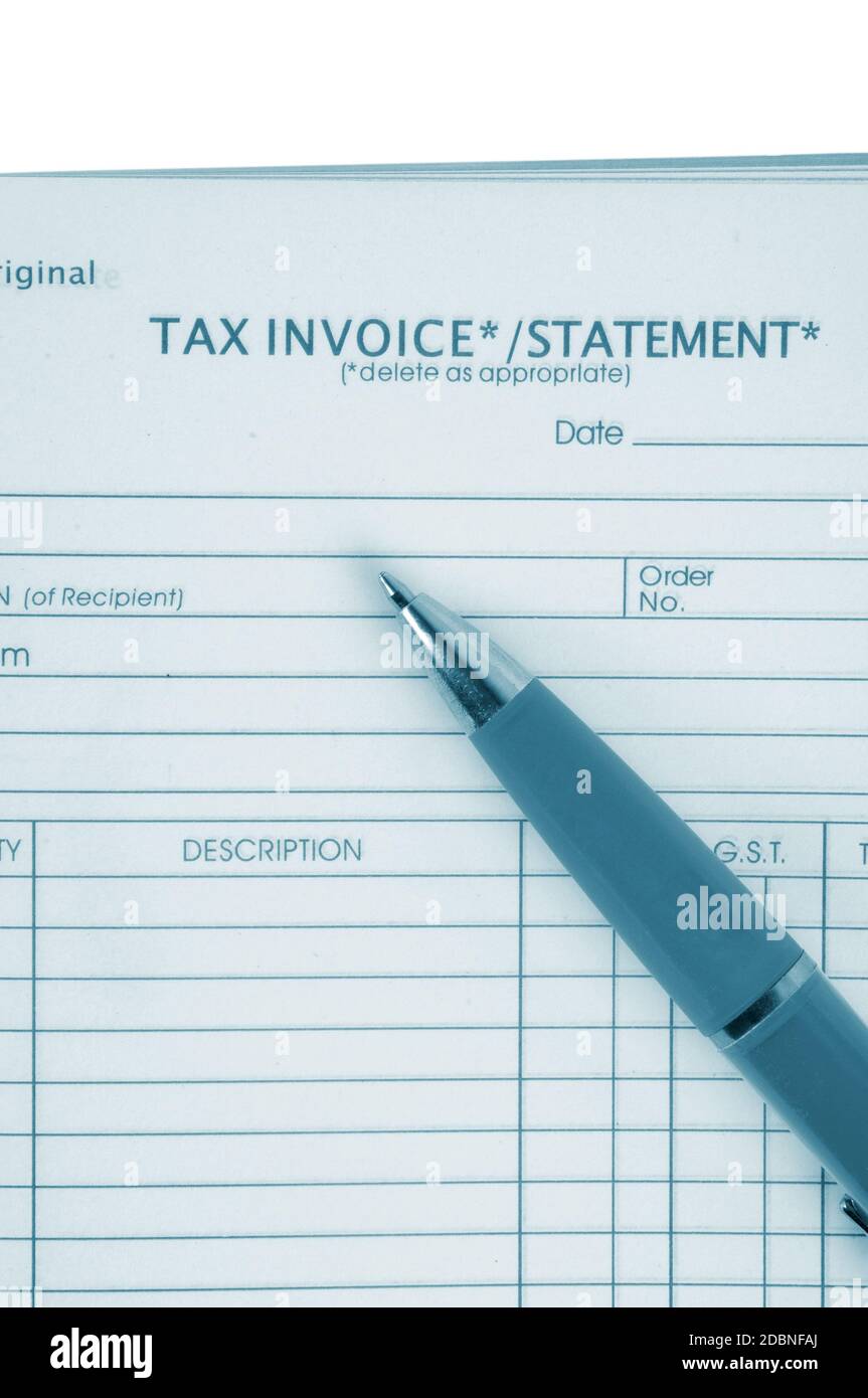 tax invoice book with pen Stock Photo Alamy