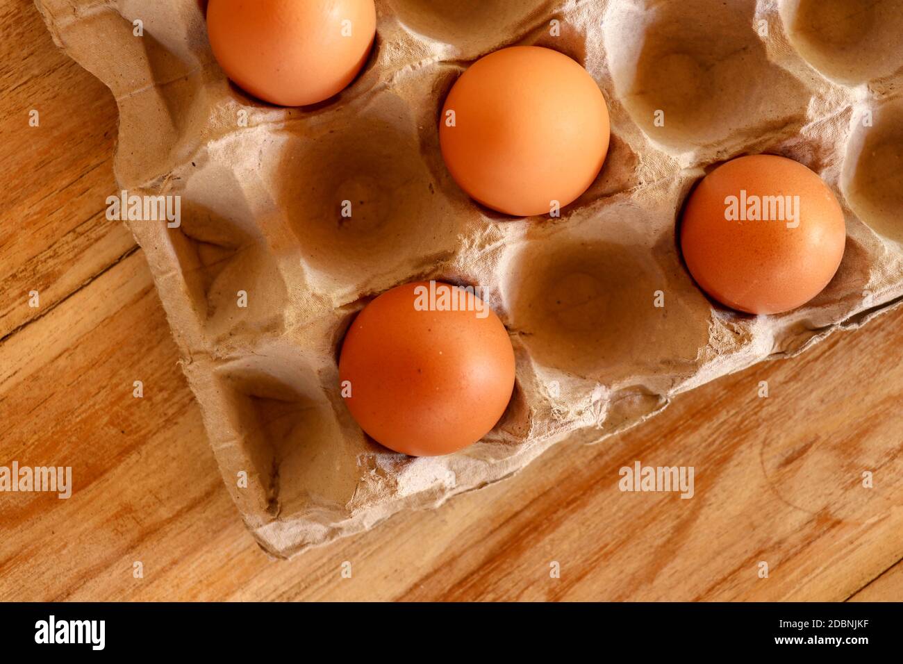 Thirty brown chicken eggs in a cardboard tray packaging. Raw fresh hen eggs in a carton box. Egg pattern background for easter, breakfast, cuisine. To Stock Photo